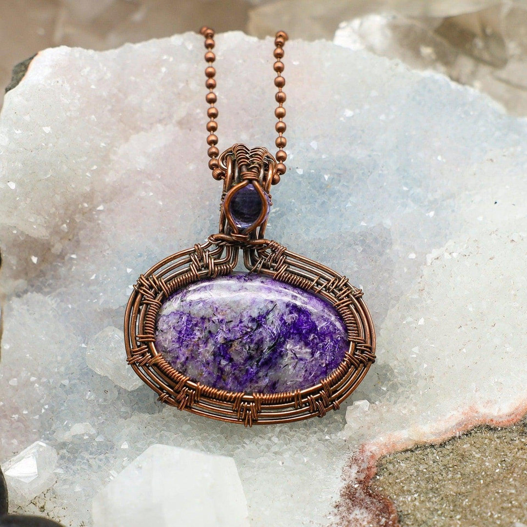 Vibrant 2-inch dyed Quartz wire wrap pendant in healing copper, amplifying intentions and energy.