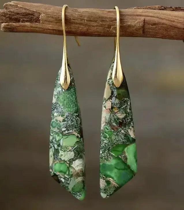 Empire Jasper Teardrop Earrings with earthy green, cream, and rust patterns, set in gold boho hooks. Grounding and creative flow.