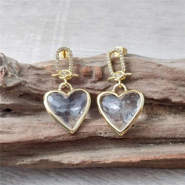 FUWO Handcraft Natural Clear Quartz Heart Shaped Faceted Crystal Earrings with gold-tone accents and cubic zirconia.