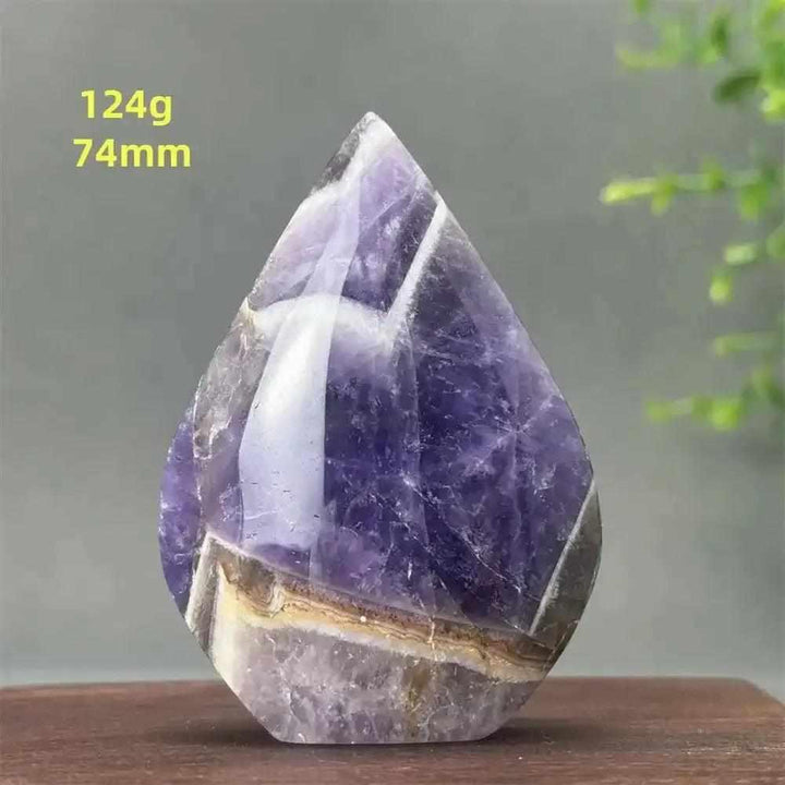 Hand-polished Fantasy Amethyst torch freeform featuring purple layers and milky quartz for calm and intuition.