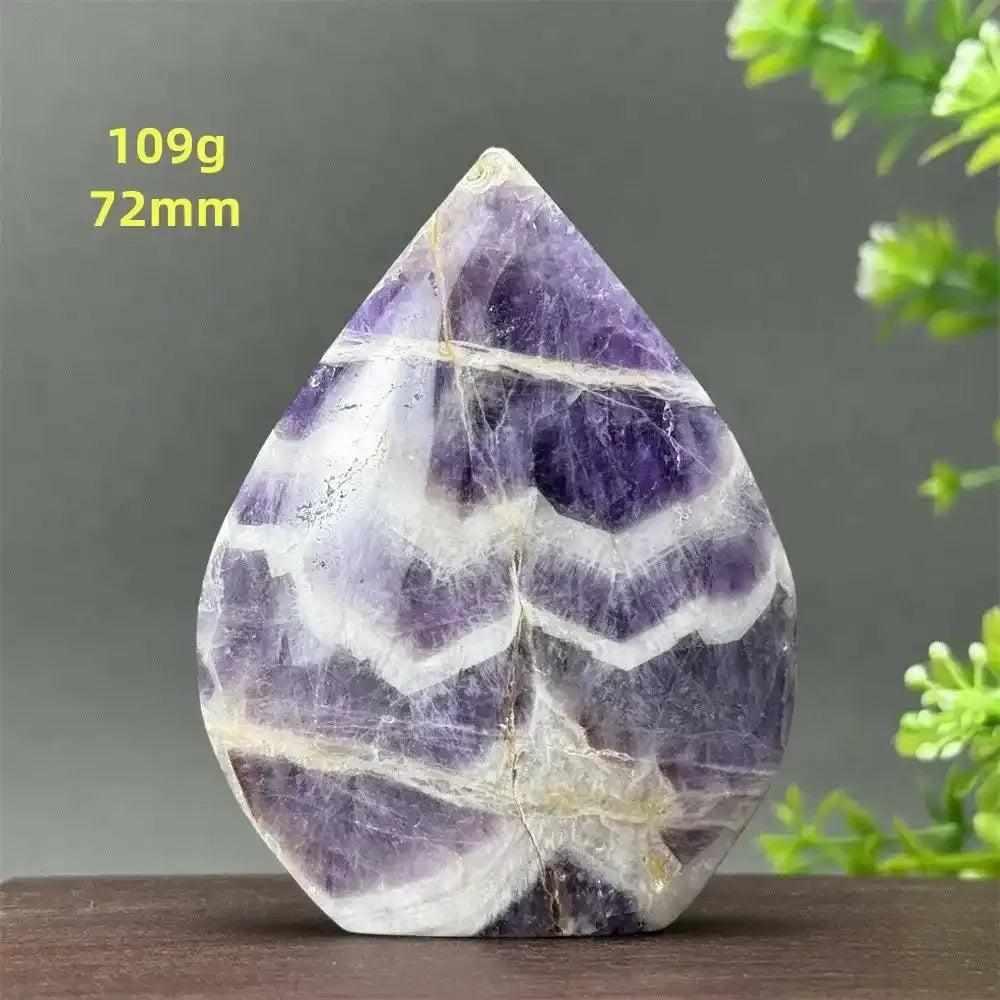 Fantasy Amethyst torch freeform featuring layered purple and white quartz for crown chakra meditation and calm energy.