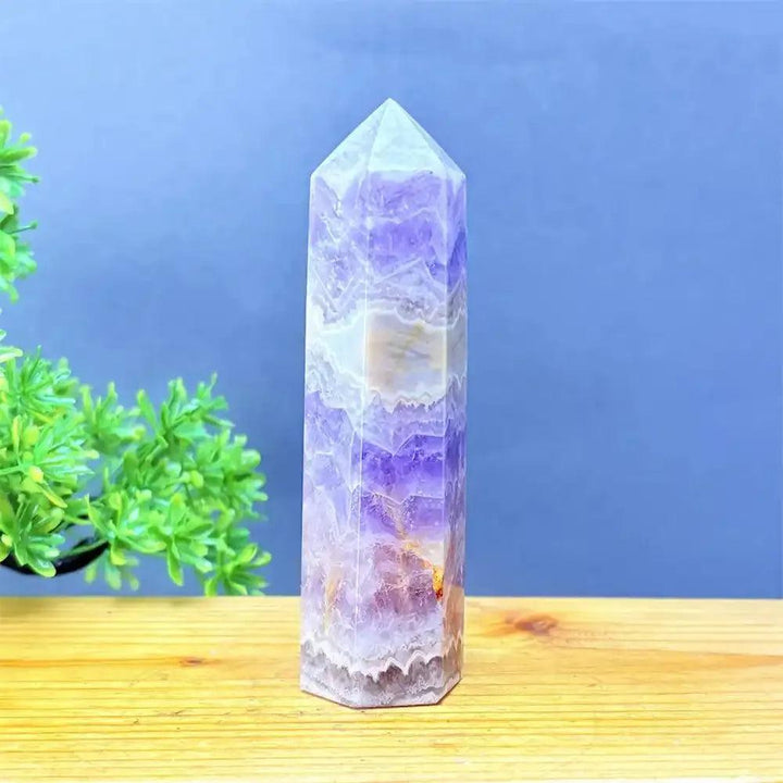 Hand-polished Fantasy Amethyst tower featuring layered purple and white quartz for Third Eye chakra meditation.