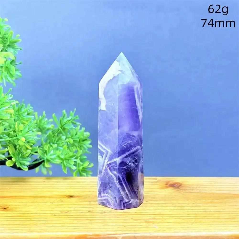 Fantasy Amethyst tower featuring layered purple and white quartz, hand-polished into a 74mm point for calming energy.