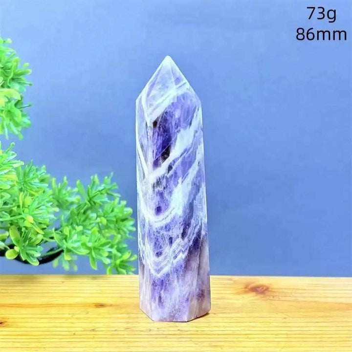 Hand-polished Fantasy Amethyst tower with purple and white quartz layers, perfect for meditation and crown chakra energy.