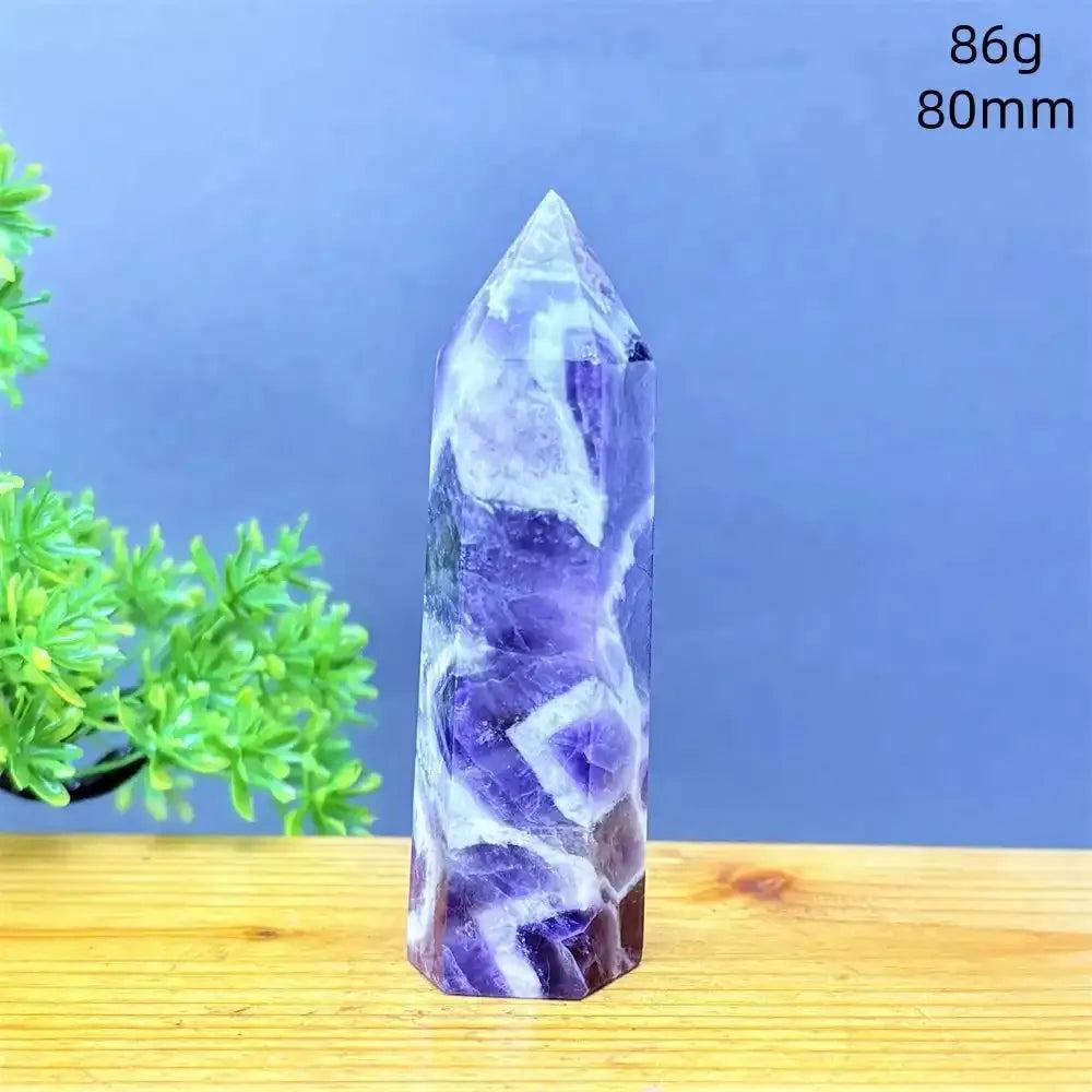 Fantasy Amethyst tower with layered purple and white quartz, a faceted point for meditation and Third Eye chakra energy.