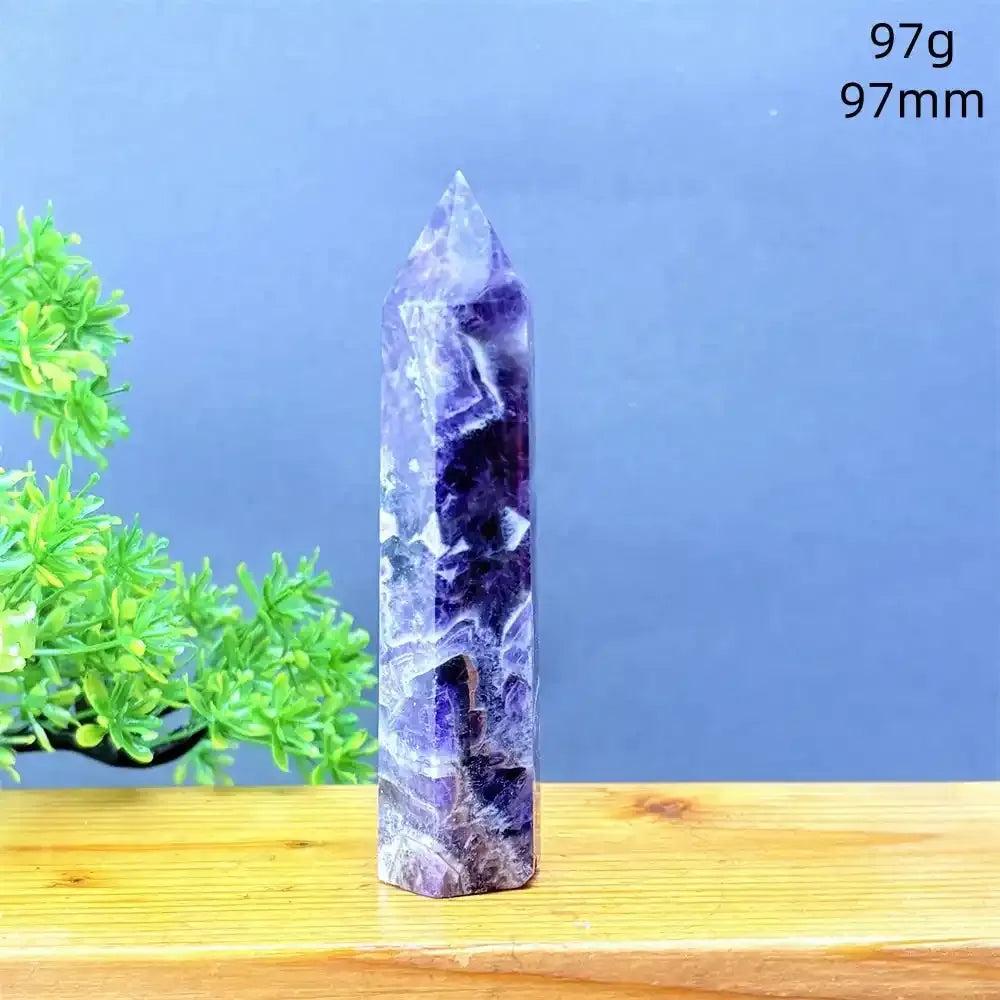 Hand-polished Fantasy Amethyst tower with purple and white quartz layers, perfect for Crown Chakra meditation and calm.