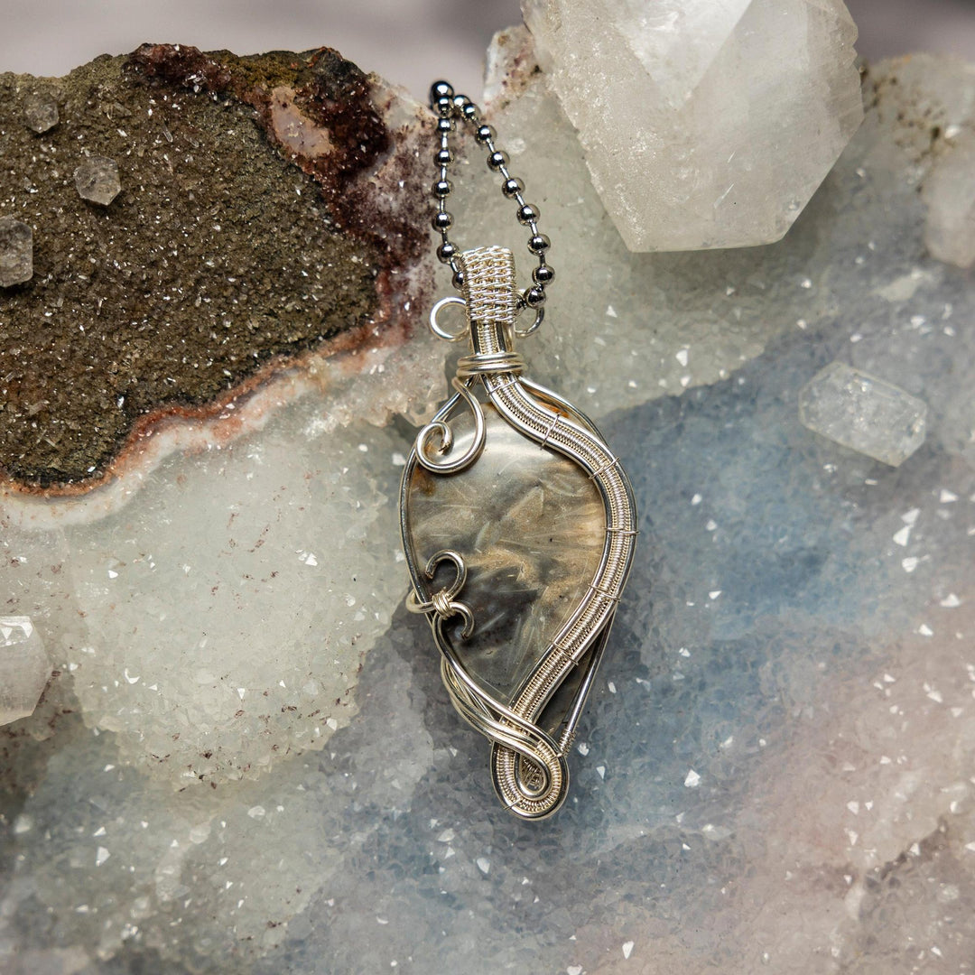 Feather Agate Wire Wrap Pendant, 2.48" handcrafted in healing copper wire, offering grounding and spiritual connection.