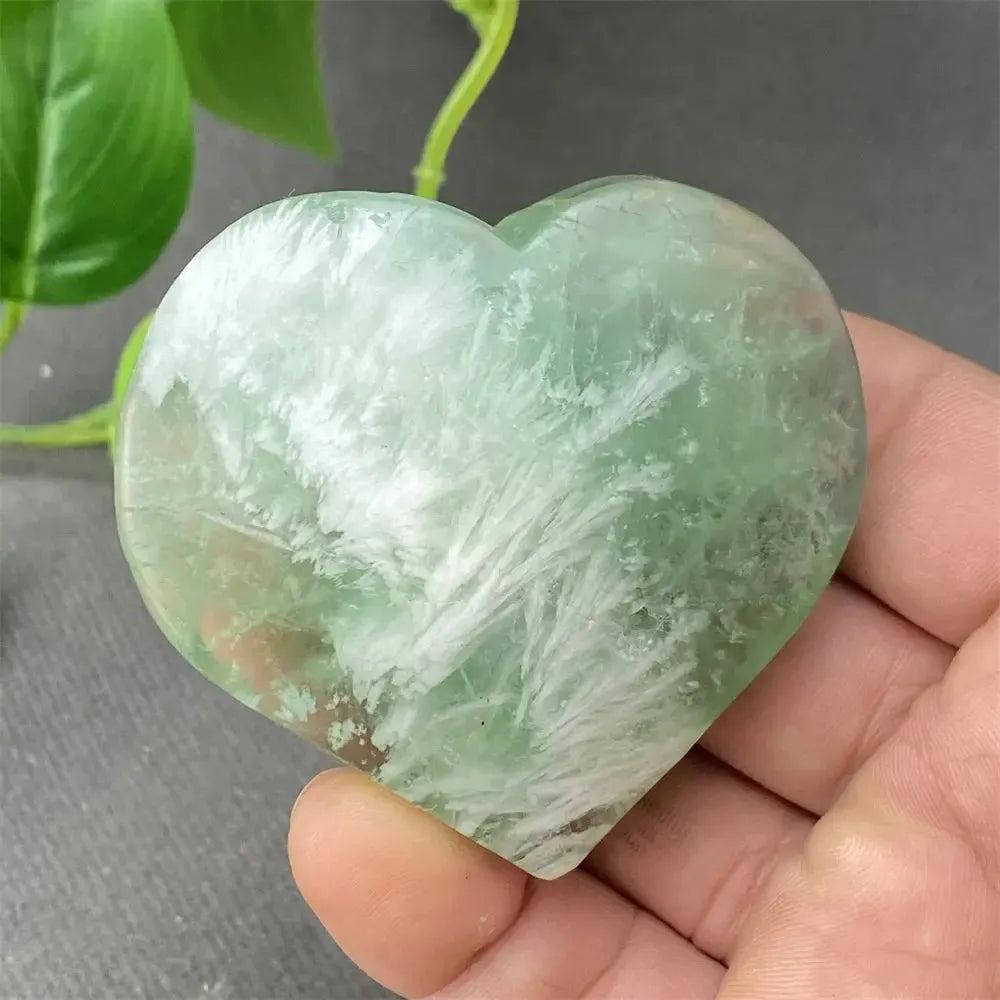 Feather Fluorite Crystal Heart: Polished green and white fluorite heart, promoting mental clarity and emotional balance.
