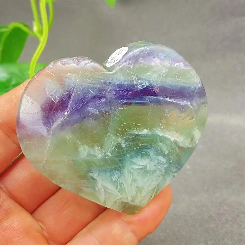 Polished Feather Fluorite Crystal Heart with stunning bands of purple, green, blue, and clear tones, promoting mental clarity.