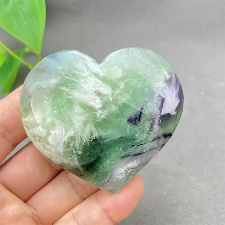 Polished Feather Fluorite Crystal Heart, showcasing calming bands of purple, green, blue, and clear tones for mental clarity.