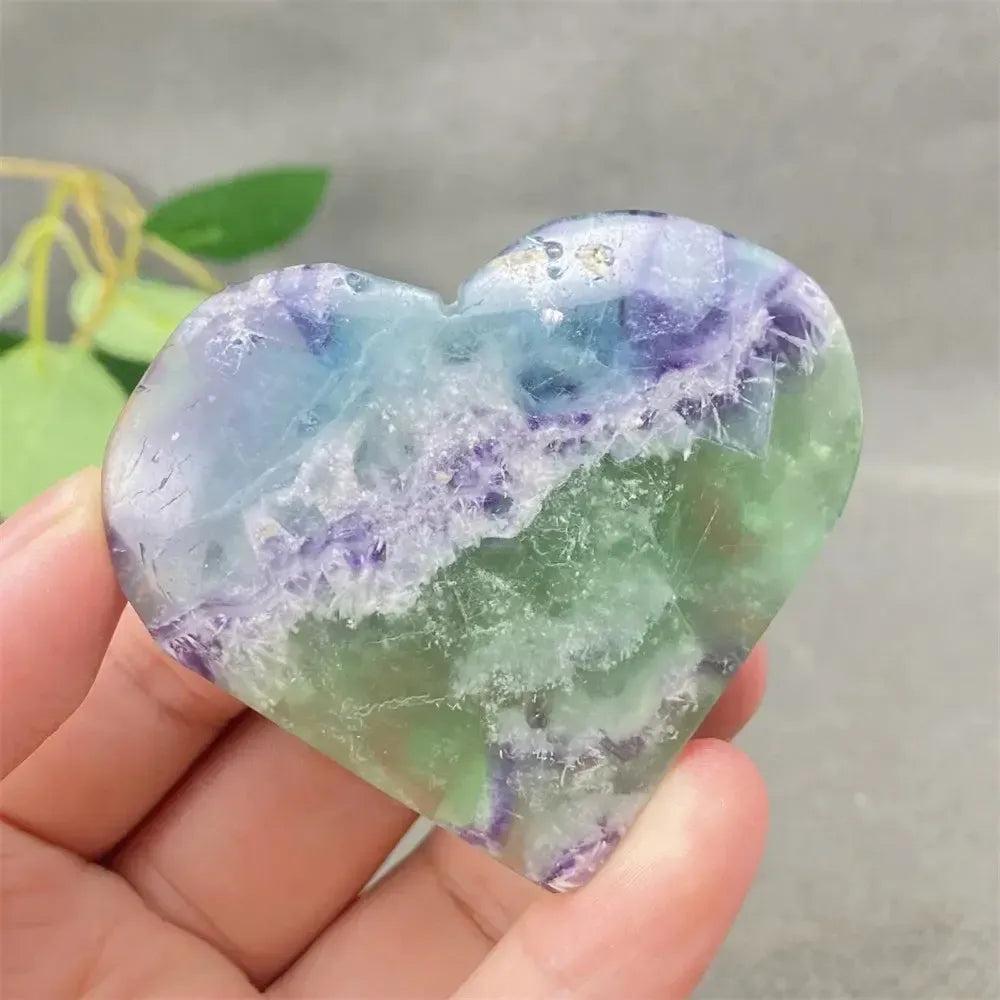 Feather Fluorite Crystal Heart: Polished heart-shaped crystal with calming purple, green, and blue bands for mental clarity.