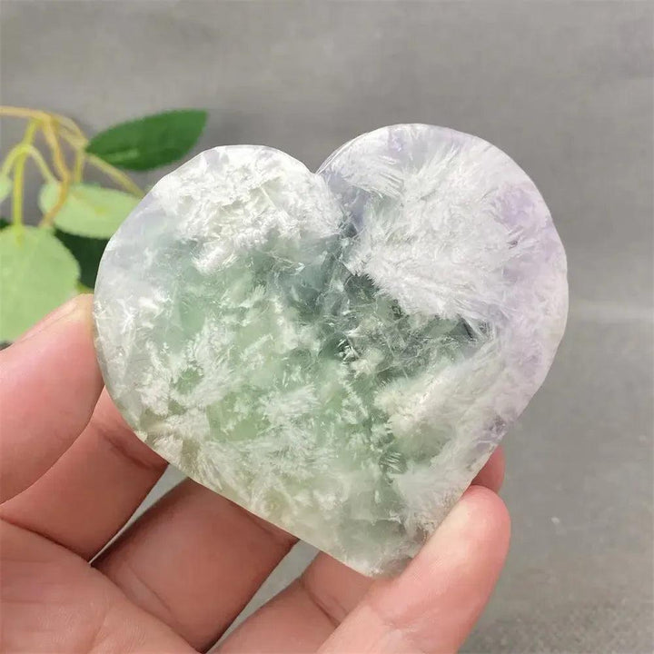 Feather Fluorite Crystal Heart: Polished heart-shaped fluorite with calming purple, green, and white feathery patterns.
