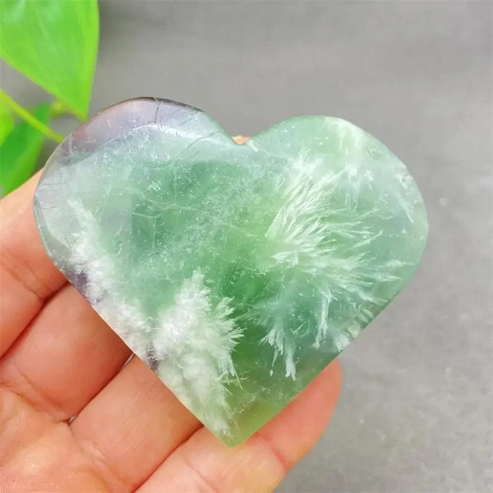 Feather Fluorite Crystal Heart: Polished green, purple, and white heart-shaped crystal for mental clarity and focus.