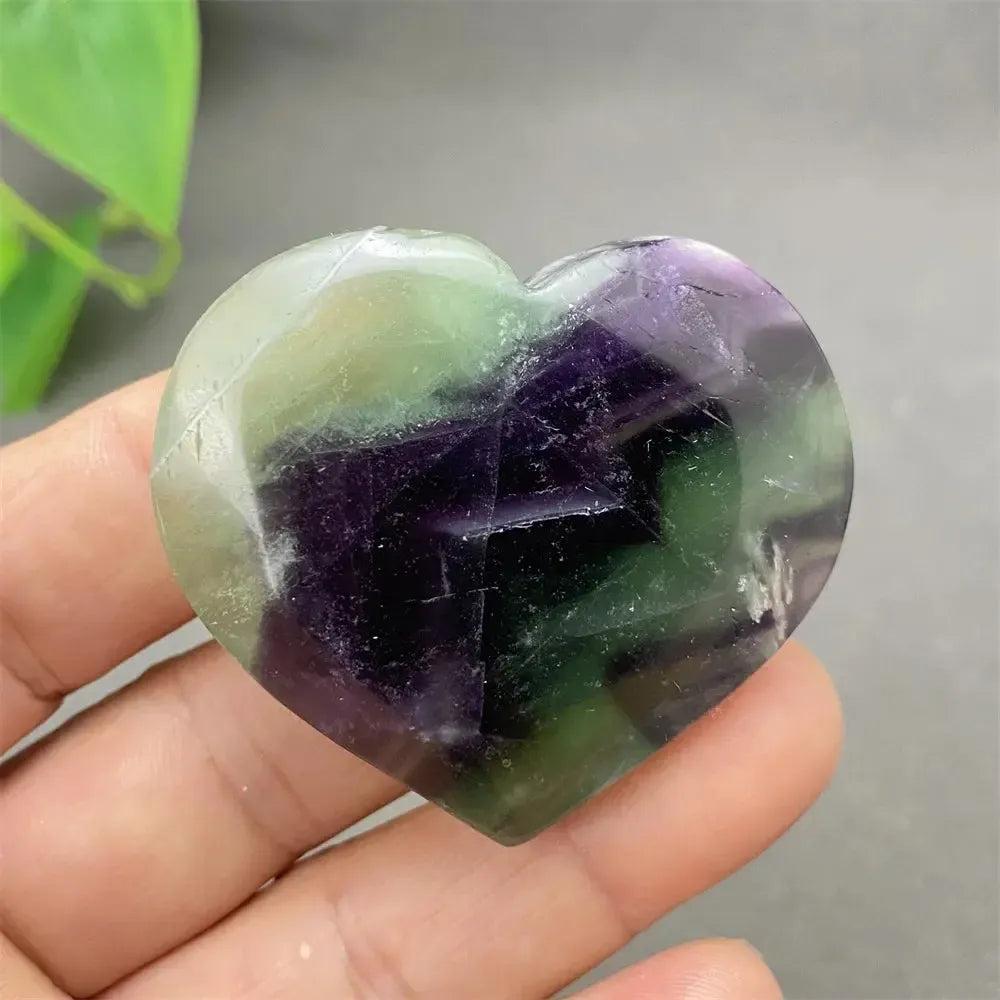 Polished Feather Fluorite Crystal Heart, showcasing stunning bands of purple, green, and clear tones for mental clarity.
