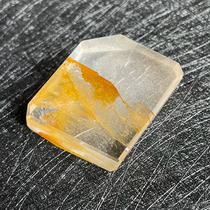 Polished Fire Quartz crystal freeform with warm orange and rust iron oxide inclusions in clear quartz.