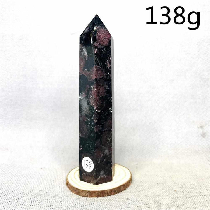 Fireworks Garnet Tower featuring deep red crystals in a dark matrix for grounding energy and root chakra healing.