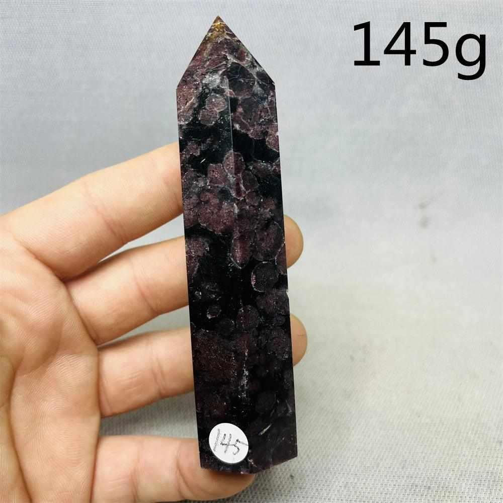 Polished Fireworks Garnet tower featuring deep red crystals in a dark matrix for grounding energy and root chakra healing.