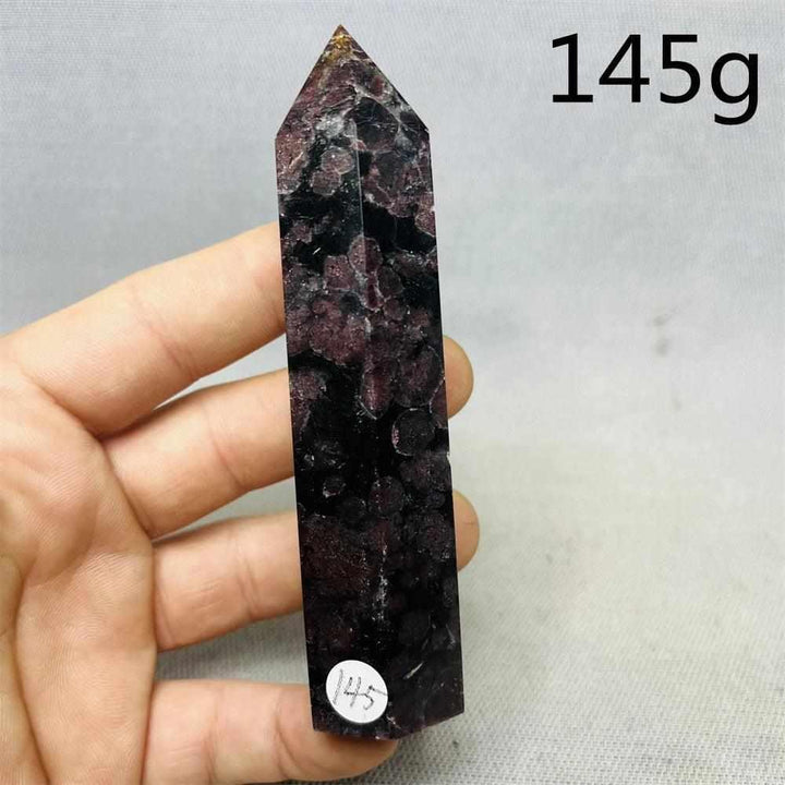 Polished Fireworks Garnet tower featuring deep red crystals in a dark matrix for grounding energy and root chakra healing.