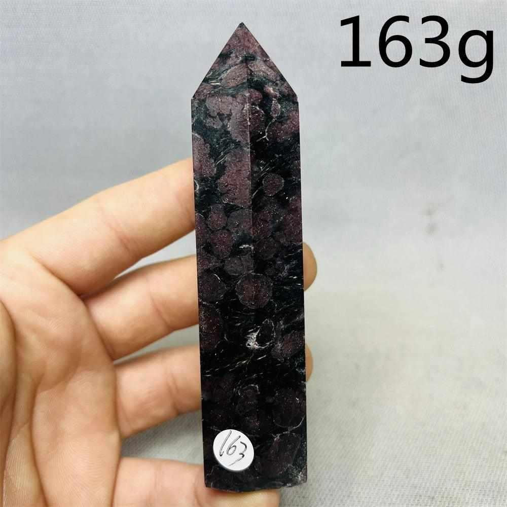 Fireworks Garnet tower featuring deep red crystals in a dark matrix, perfect for grounding energy and altar decor.