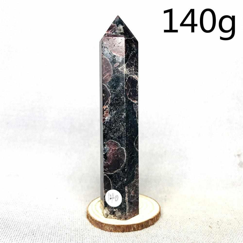 Polished Fireworks Garnet tower featuring deep red crystals in a dark matrix for grounding energy and root chakra healing.