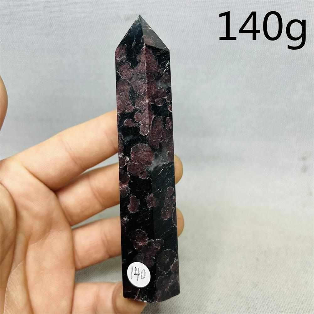 Fireworks Garnet Tower featuring deep red crystals in a dark matrix, a grounding 140g polished stone for root chakra energy.