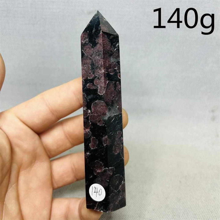 Fireworks Garnet Tower featuring deep red crystals in a dark matrix, a grounding 140g polished stone for root chakra energy.