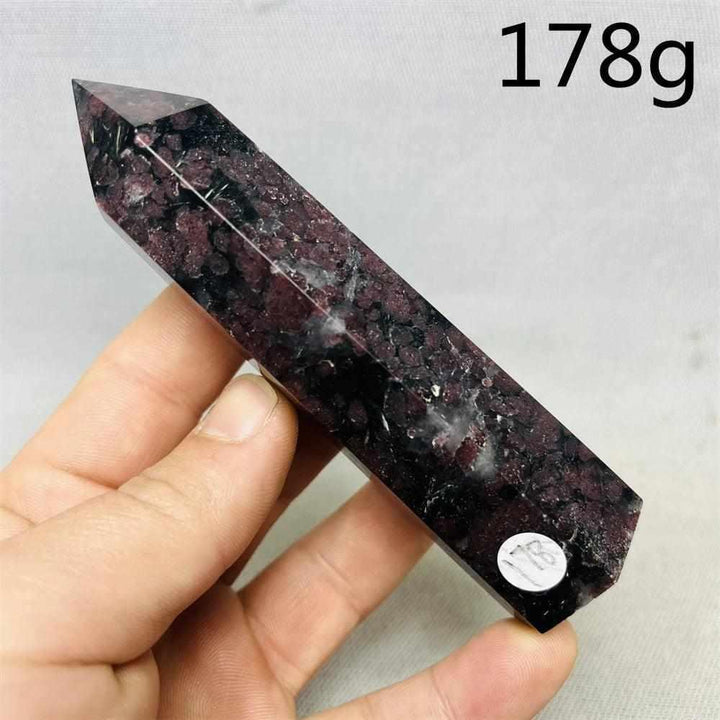 Polished Fireworks Garnet tower featuring deep red crystals in a dark matrix, perfect for grounding and vitality.