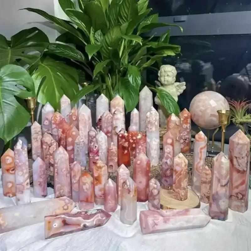 Polished flower agate towers featuring pink and white blossom plumes for Heart Chakra healing and emotional renewal.