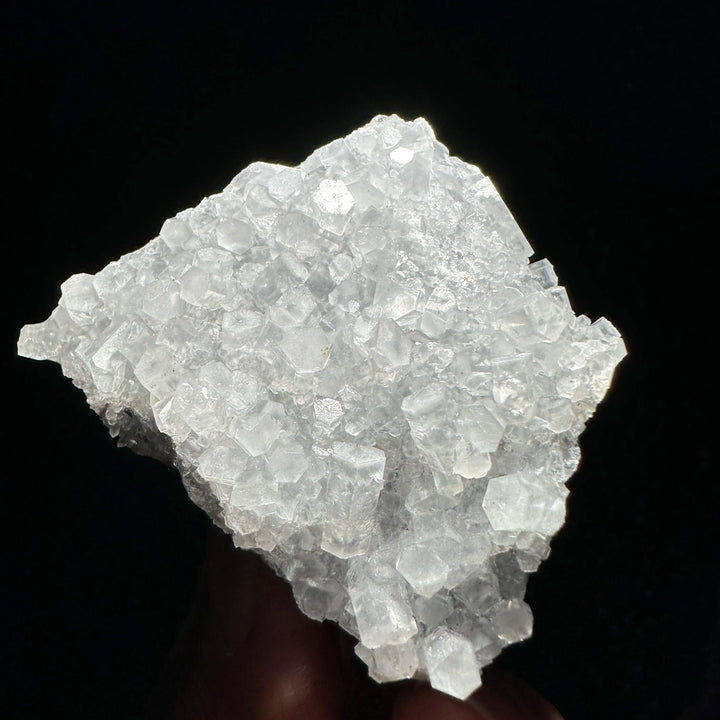 Sparkling white raw columnar calcite crystal cluster, a high transparent healing stone specimen.