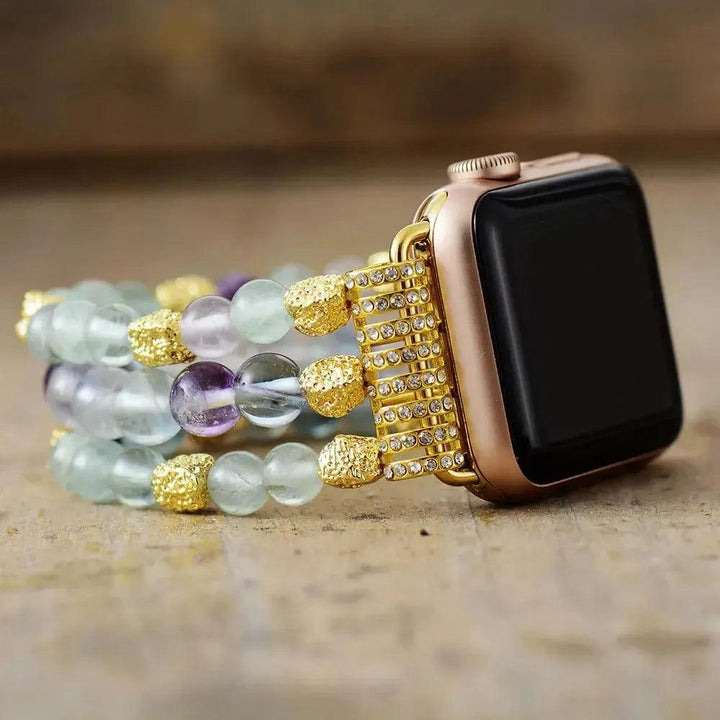 Natural Crystal Apple iWatch Band with calming Fluorite, Amethyst, and clear beads, gold accents, and rose gold watch.