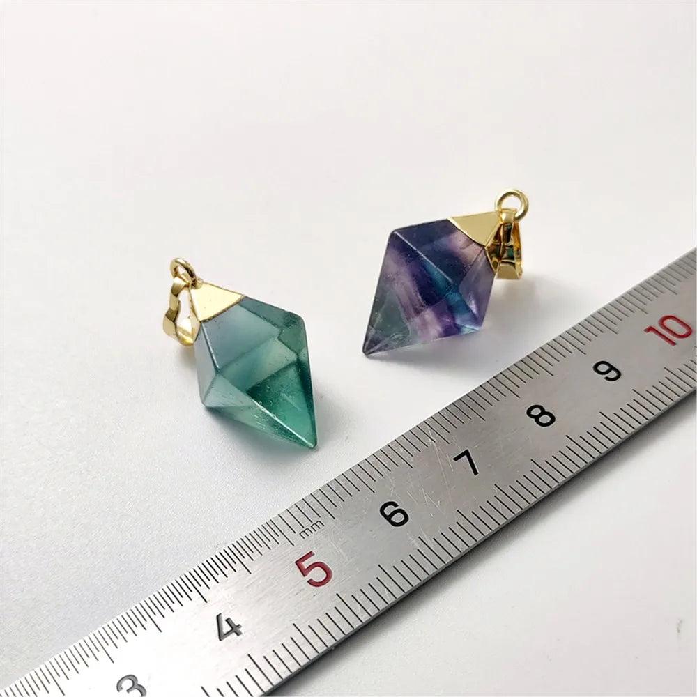 Fluorite crystal rhombus drop pendants in violet and teal, set in gold-plated copper for focus and mental clarity.