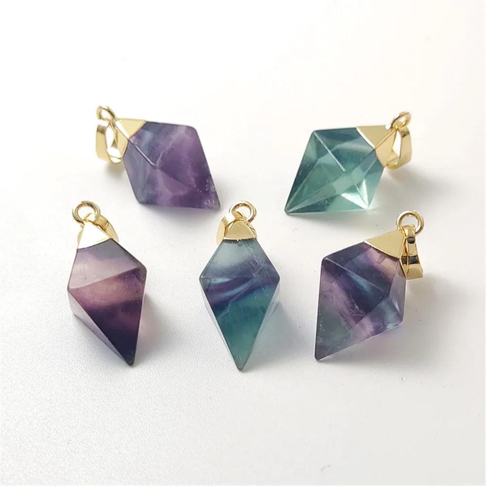 Fluorite crystal rhombus drop pendants in violet and teal, set in gold-plated copper for focus and mental clarity.