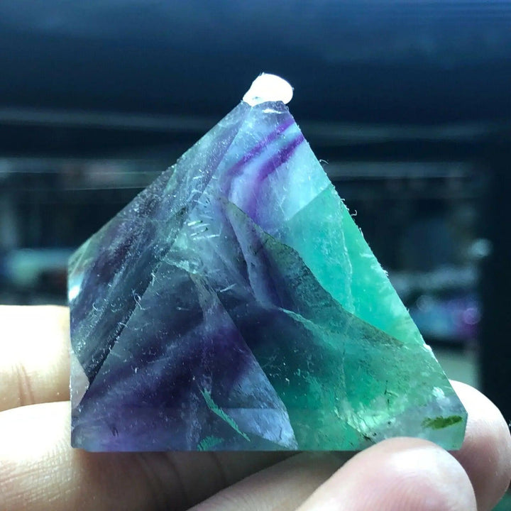 Vibrant Fluorite Crystal Pyramid for Focus and Calm, showcasing shifting purple, green, and teal hues.