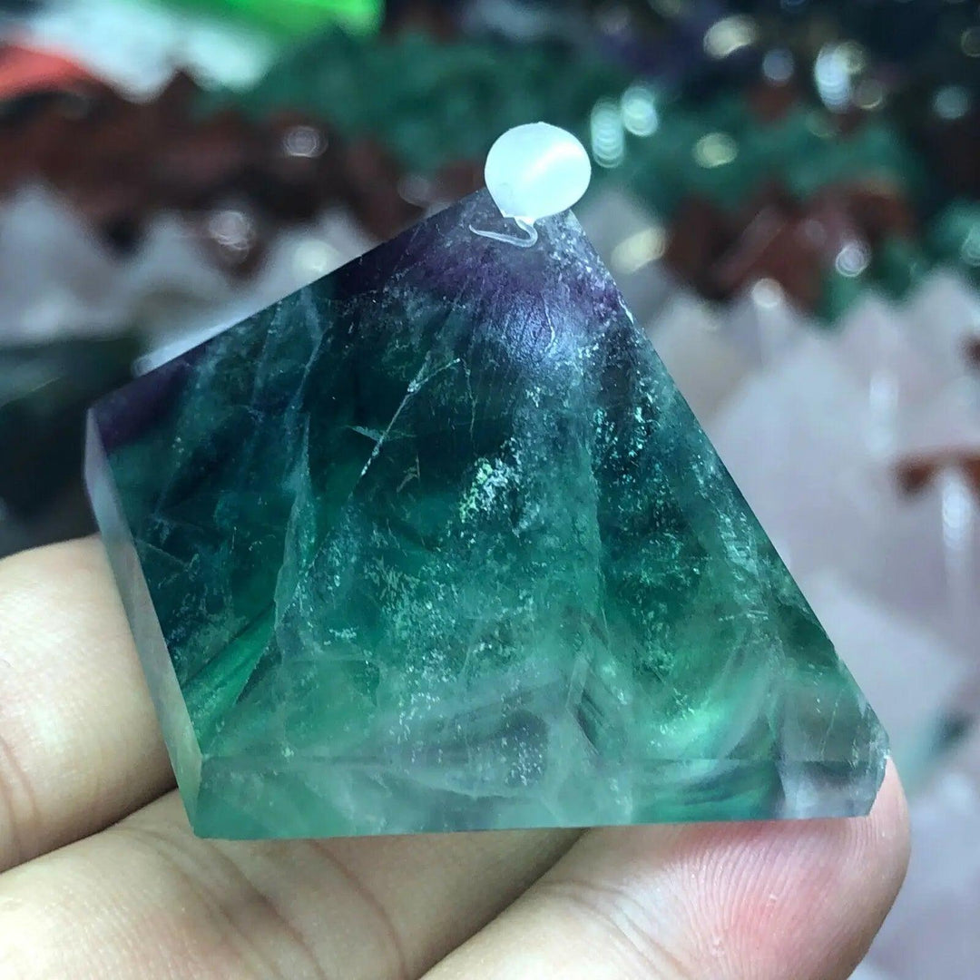 Vibrant Fluorite Crystal Pyramid, shifting from purple to green, for focus and calm.