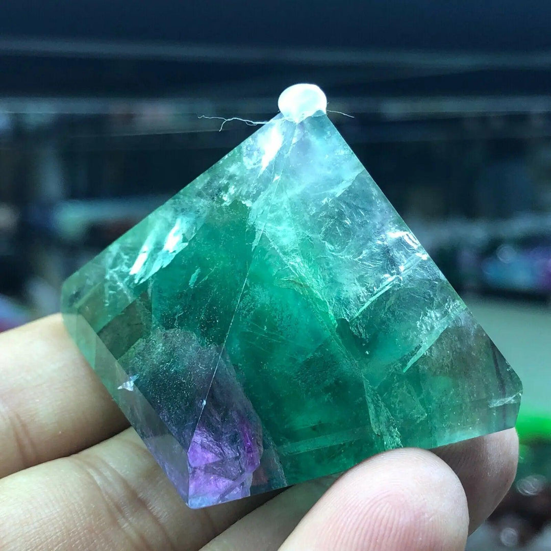 Vibrant Fluorite Crystal Pyramid for Focus and Calm, showcasing shifting greens, purples, and teal.