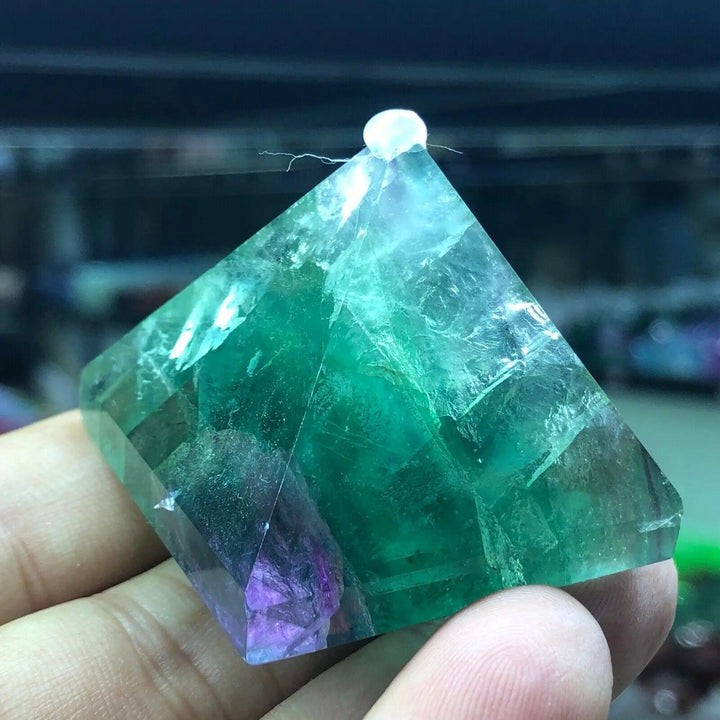 Vibrant Fluorite Crystal Pyramid for Focus and Calm, showcasing shifting greens, purples, and teal.
