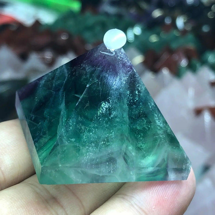 Vibrant Fluorite Crystal Pyramid for Focus and Calm, showcasing shifting purple, green, and teal hues.