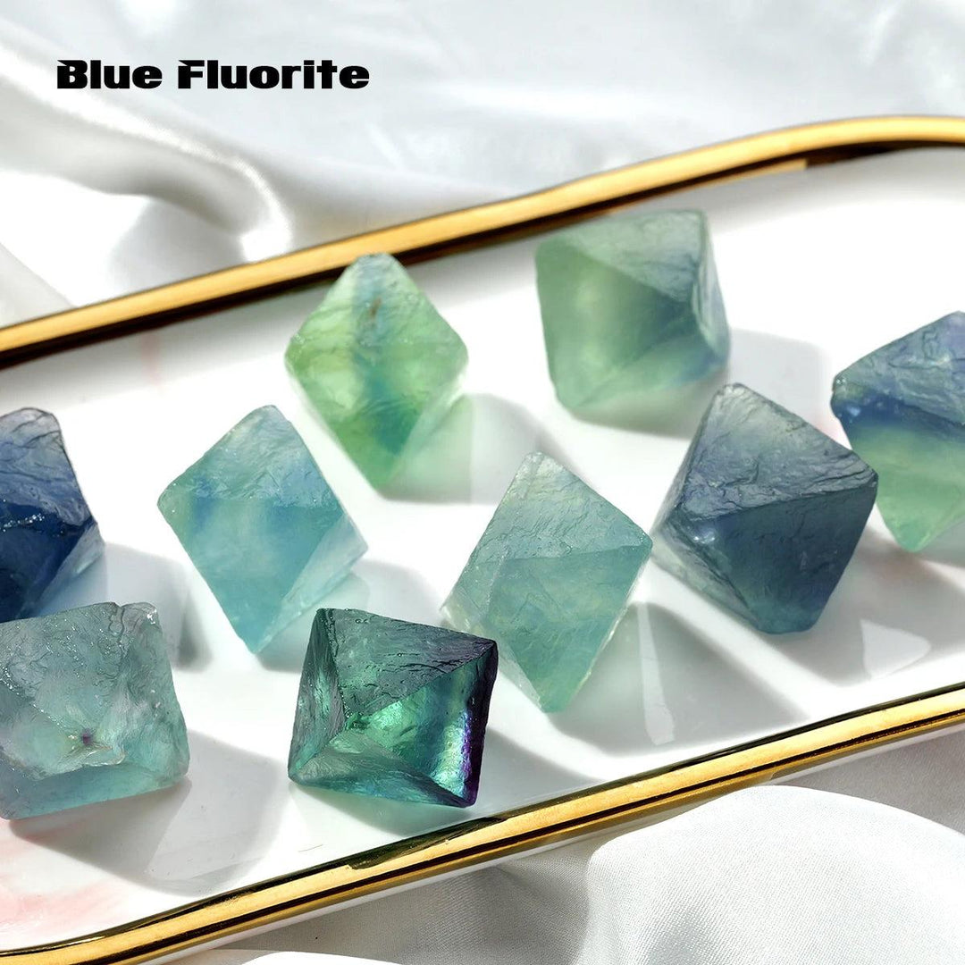 Raw Fluorite Crystal Octahedron stones in shades of blue and green, perfect for focus and healing.