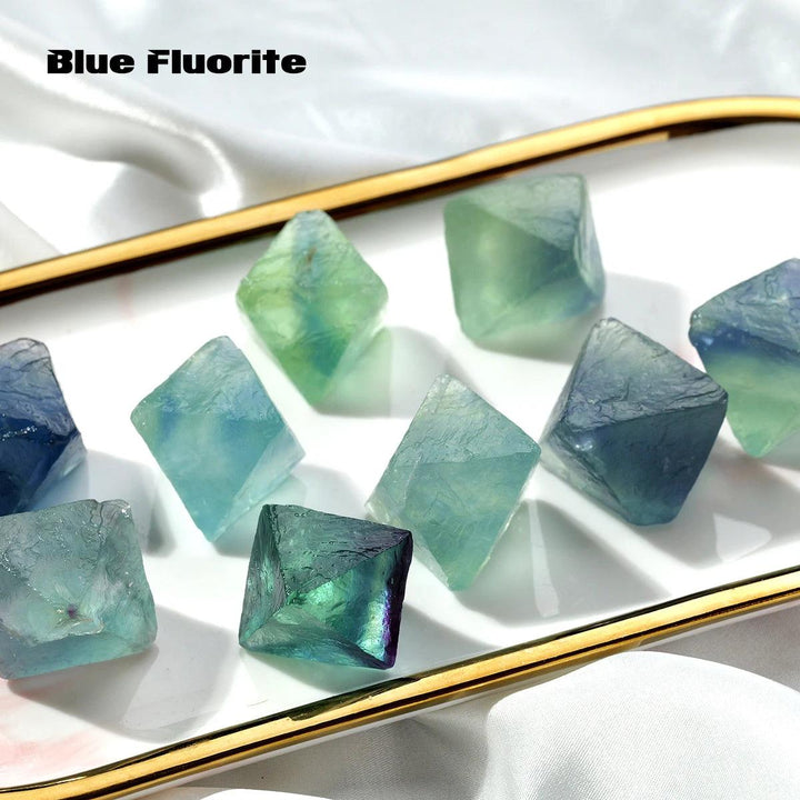 Raw Fluorite Crystal Octahedron stones in shades of blue and green, perfect for focus and healing.