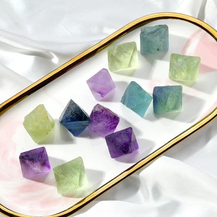 Raw Fluorite Crystal Octahedrons in deep violet, seafoam green, and cool blue, perfect for focus & healing.