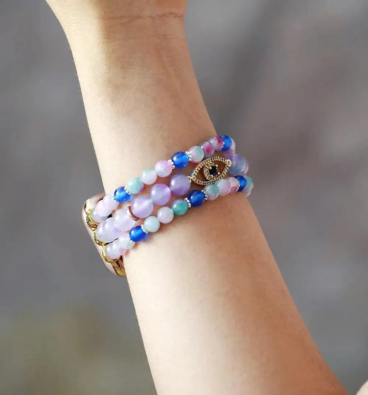 Vibrant Fluorite Evil Eye Apple iWatch Band with multicolored beads for clarity and protection.