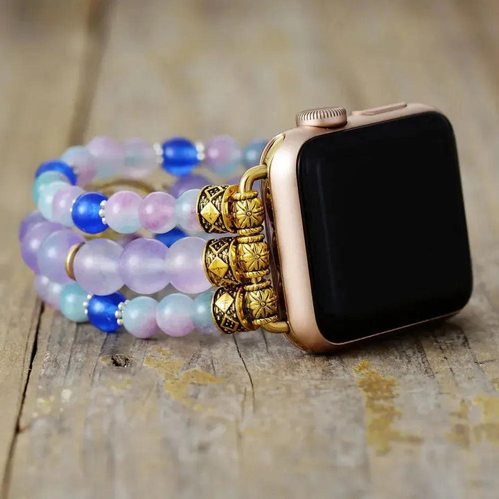 Fluorite Evil Eye Apple iWatch Band with multicolored purple, green, blue beads, zircon evil eye, and gold connectors.
