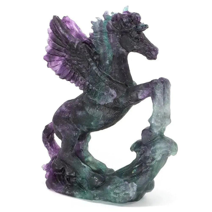Crystal Destiny's 8.5" fluorite flying horse carving, showcasing purple and green hues, for clarity and focus.