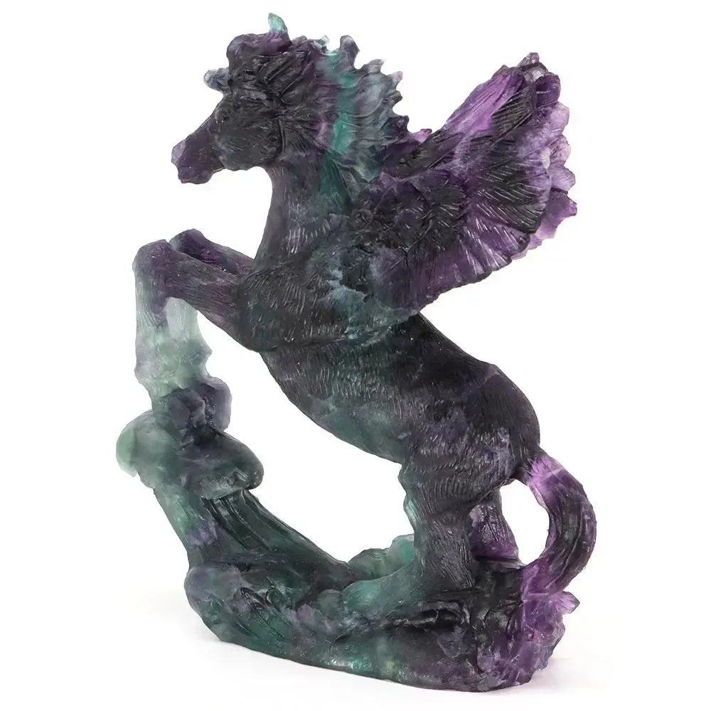 8.5" Fluorite Flying Horse carving by Crystal Destiny, featuring purple and green hues, symbolizing freedom and clarity.