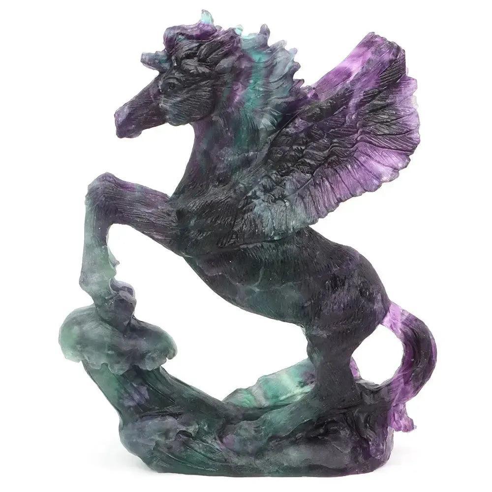 8.5" Fluorite Flying Horse carving by Crystal Destiny, showcasing purple and green hues, symbolizing freedom and clarity.