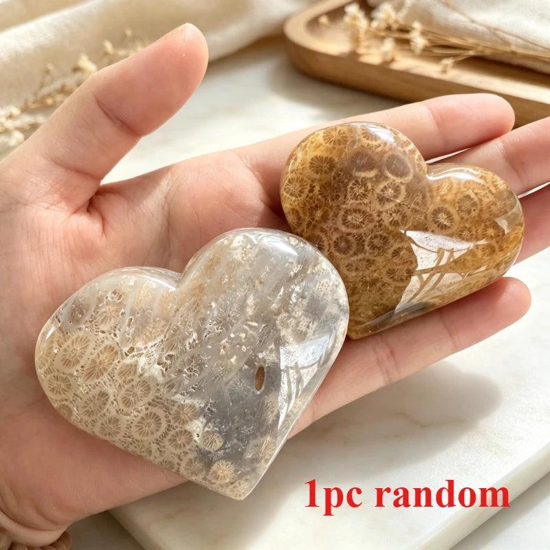 Polished Fossilized Coral Jade crystal heart with earthy cream and rust patterns for heart chakra healing and grounding.