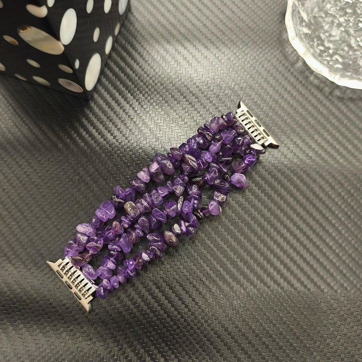 Four-row Amethyst crystal Apple Watch band featuring calming purple natural stone beads for a stylish, healing accessory.