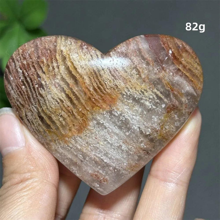 82g Natural Garden Thousand-Layer crystal heart ornament with unique earthy layers for healing and spiritual meditation.