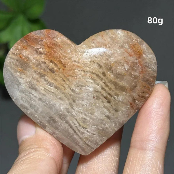 80g natural thousand-layer crystal heart ornament with earthy tones for spiritual healing, meditation, and Feng Shui decor.