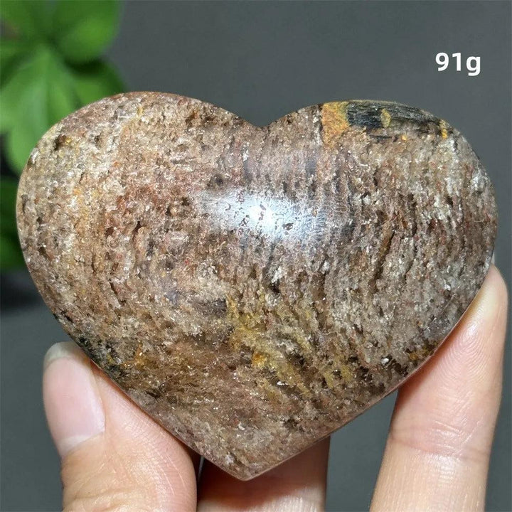 91g Natural Garden Thousand-Layer crystal heart ornament with earthy textures for spiritual healing and Feng Shui decor.